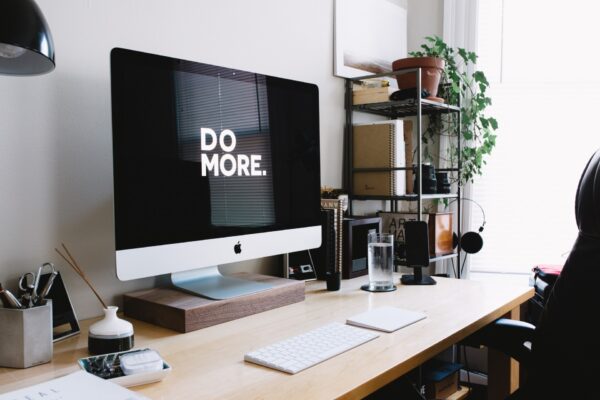 Computer monitor with "do more." written on screen.